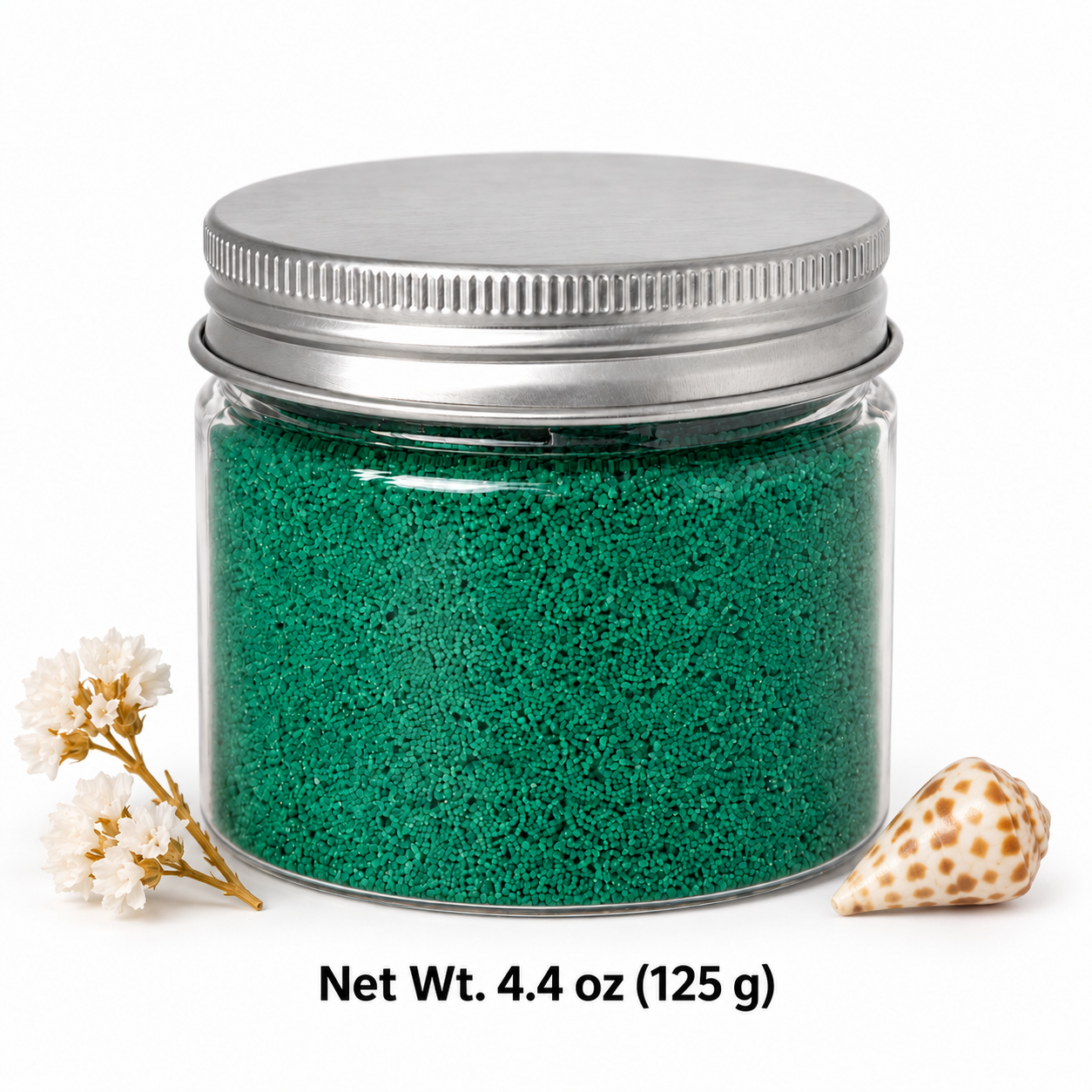 Clear jar of Coral Lagoon quartz sand